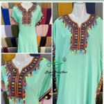 Gandora de mujer de pompones