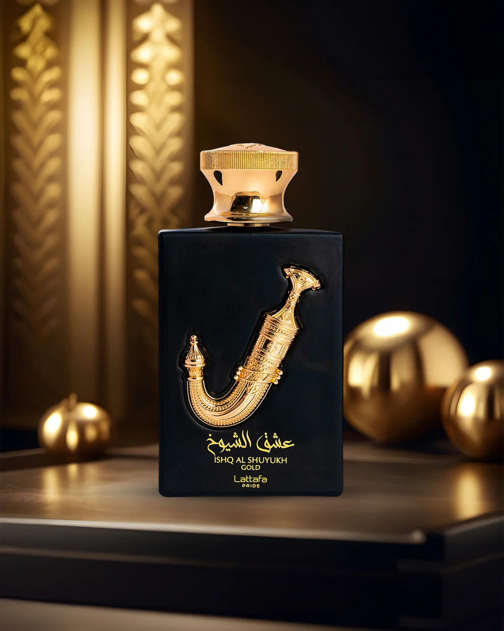 Ishq-Al-Shuyukh-Gold-perfume-bottle-photograph-over-reflected-surface Ishq Al Shuyukh Gold - Imagen 1